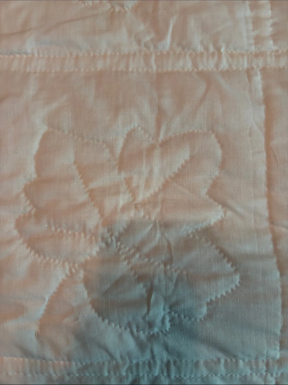 Vintage quilt handcrafted with color leaf blocks on white with green trim